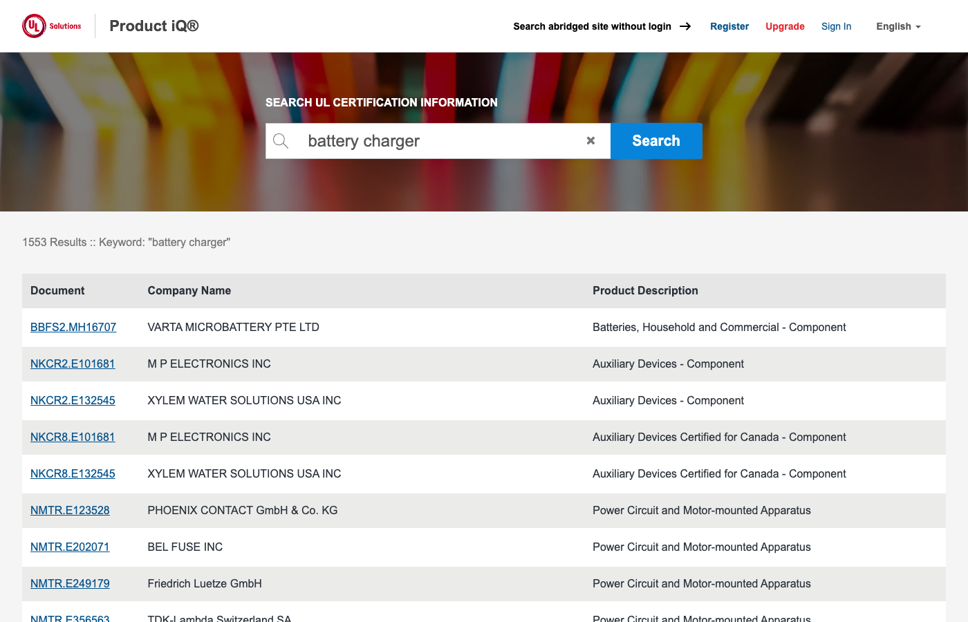 UL Product iQで「battery charger」を検索した結果。1553 Resultsの表示と、Document・Company Name・Product Descriptionの3列で企業が一覧表示されている